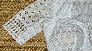 White cutwork blouse