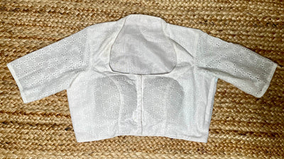 White cutwork blouse