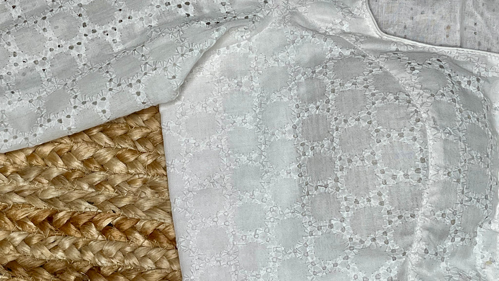 White cutwork blouse