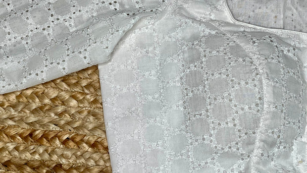 White cutwork blouse