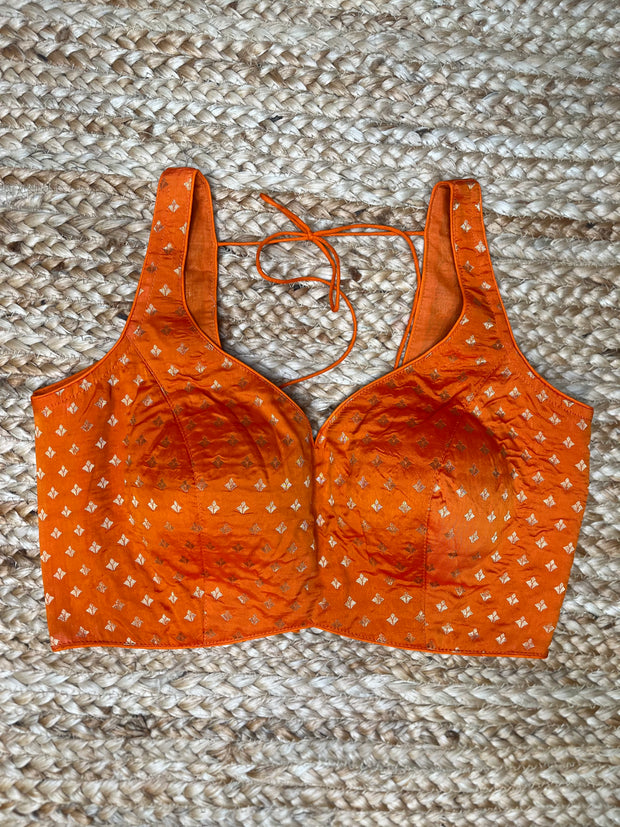 Orange sleeveless blouse