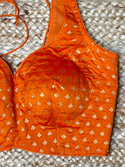 Orange sleeveless blouse