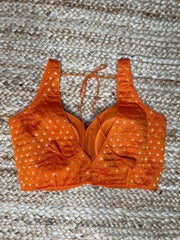 Orange sleeveless blouse