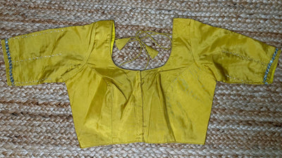 Yellow blouse with hand work