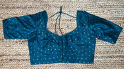 Peacock green blouse
