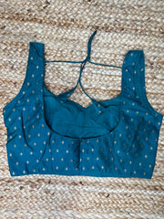 Peacock green sleeveless blouse