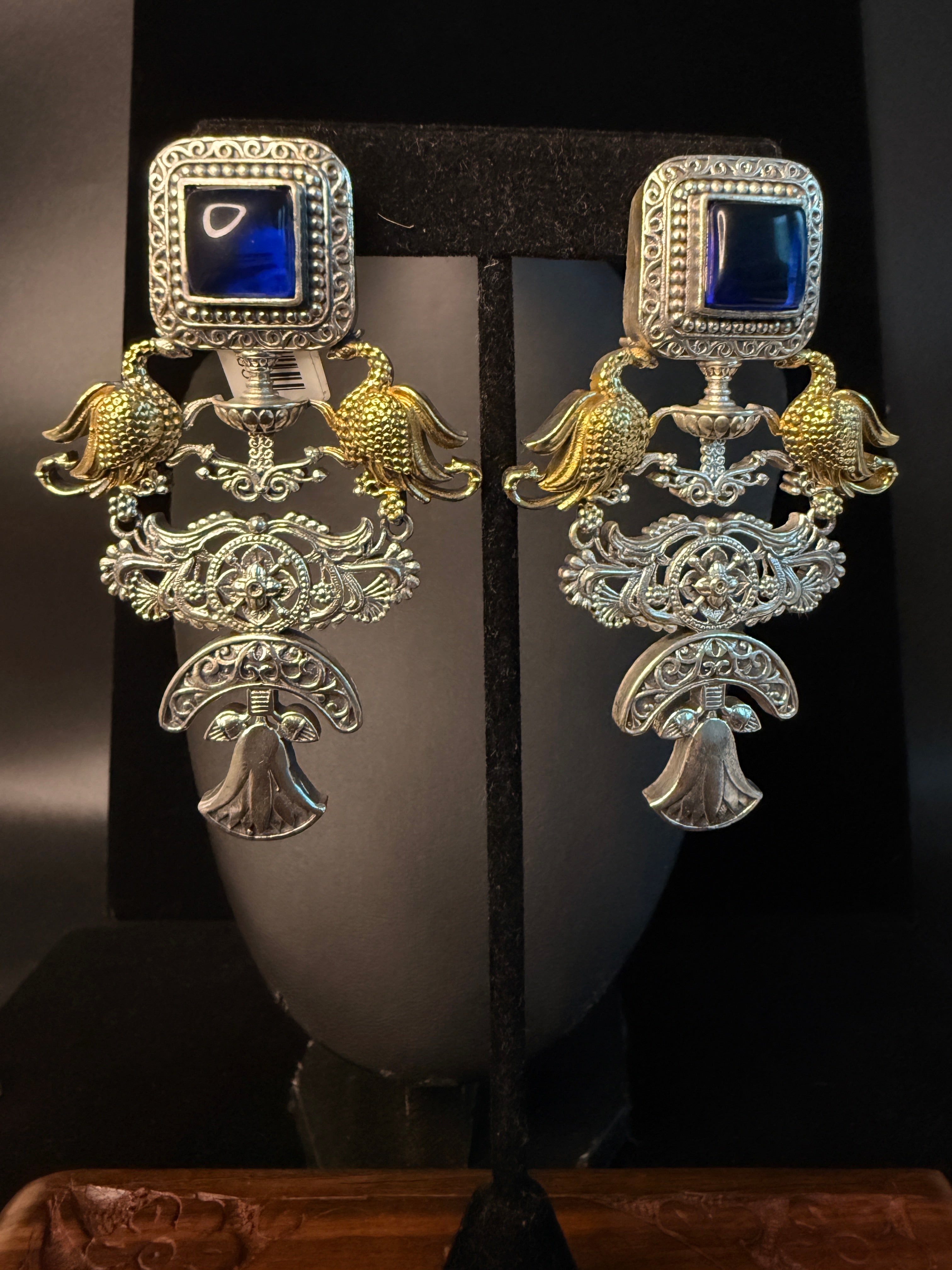 Dual tone jhumka with blue stone