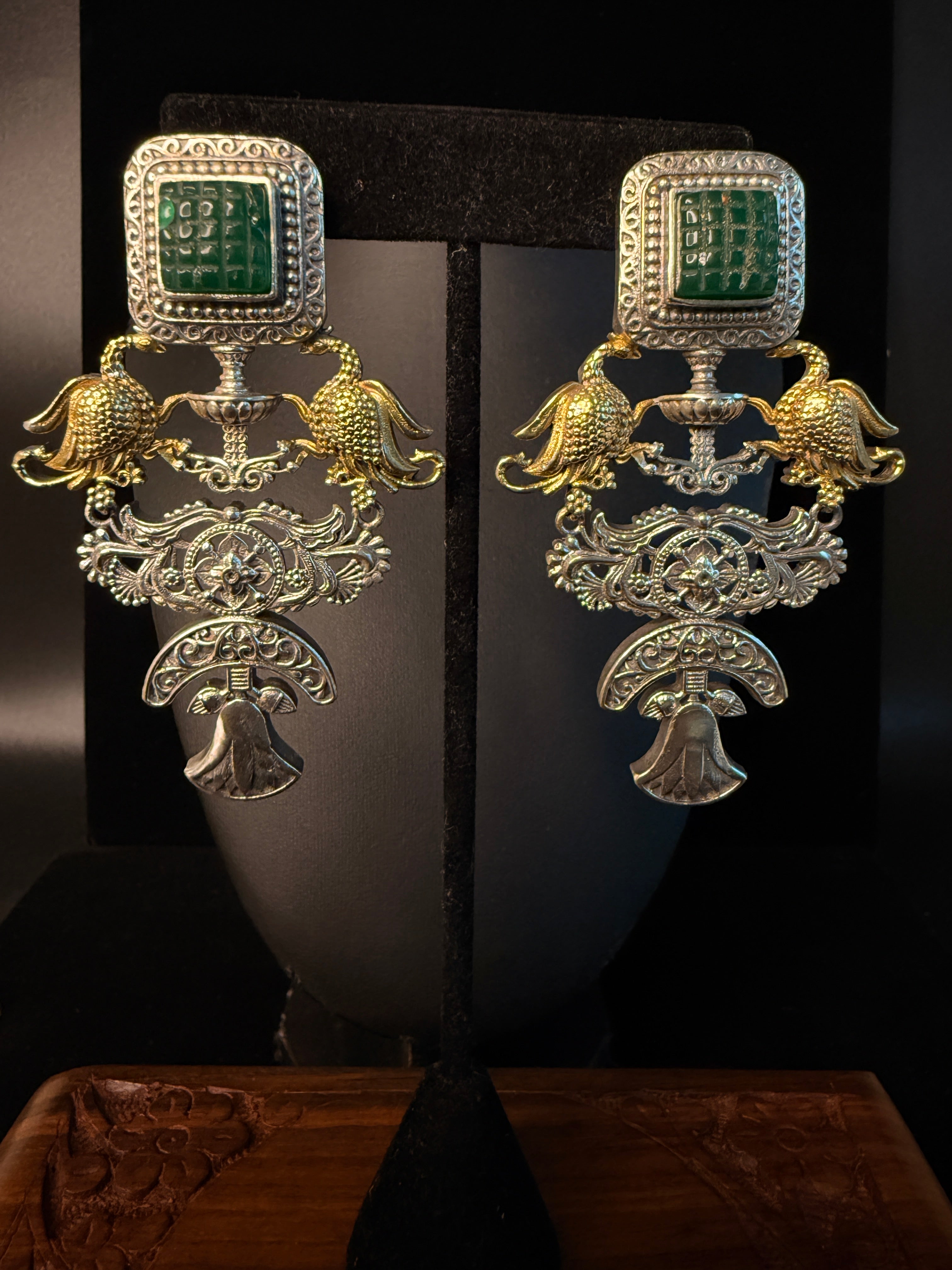 Dual tone jhumka with green stone