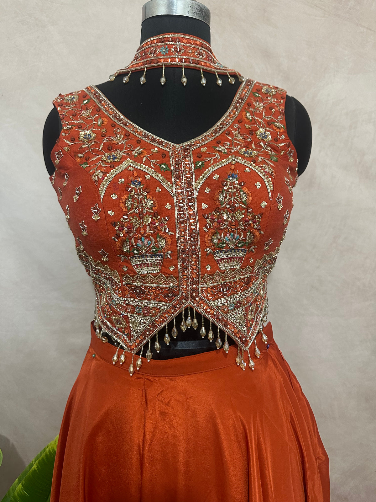 Burnt orange crop top and lehanga