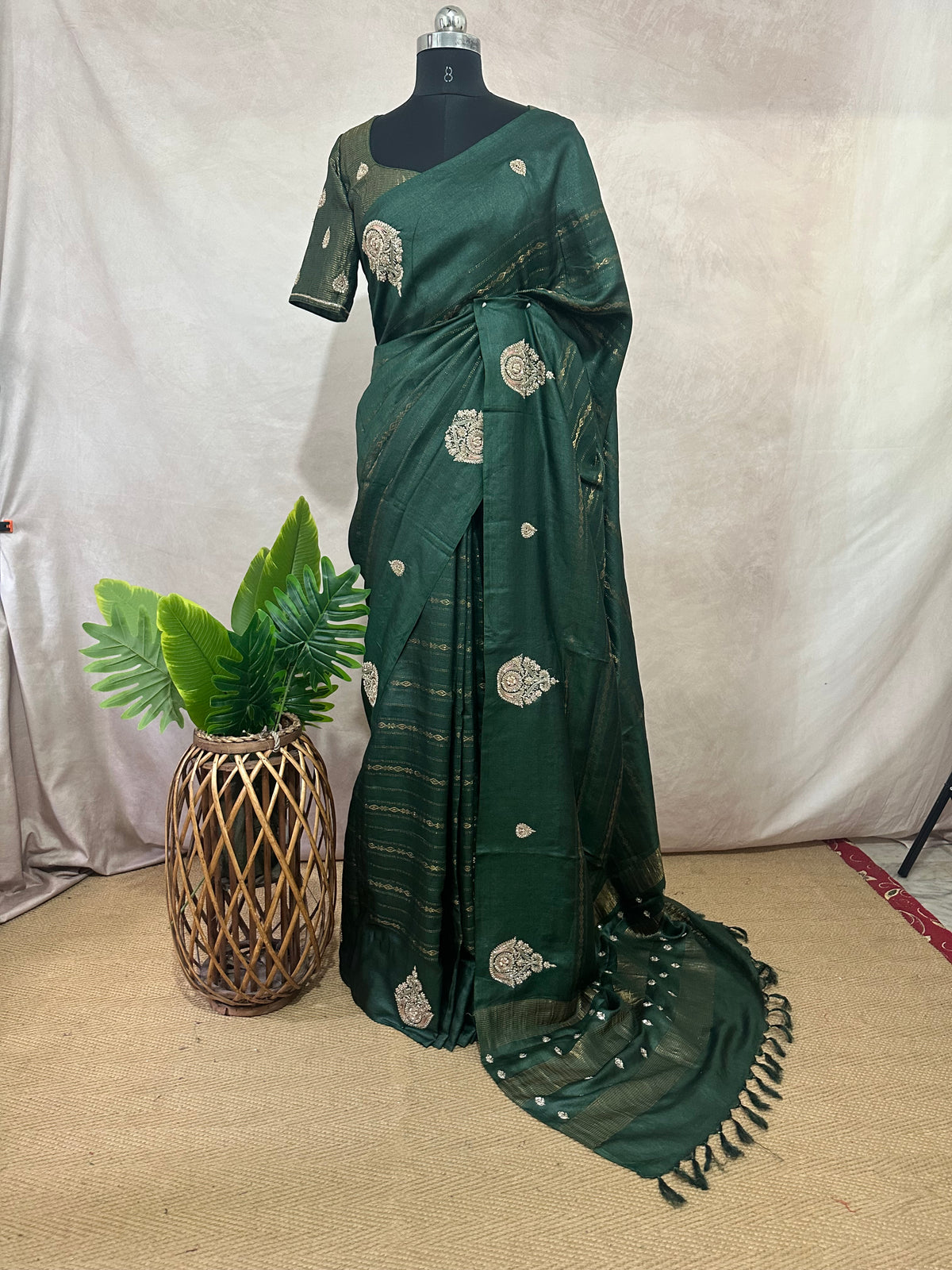 Bottle green pure tussar silk saree with hand work and stitched blouse