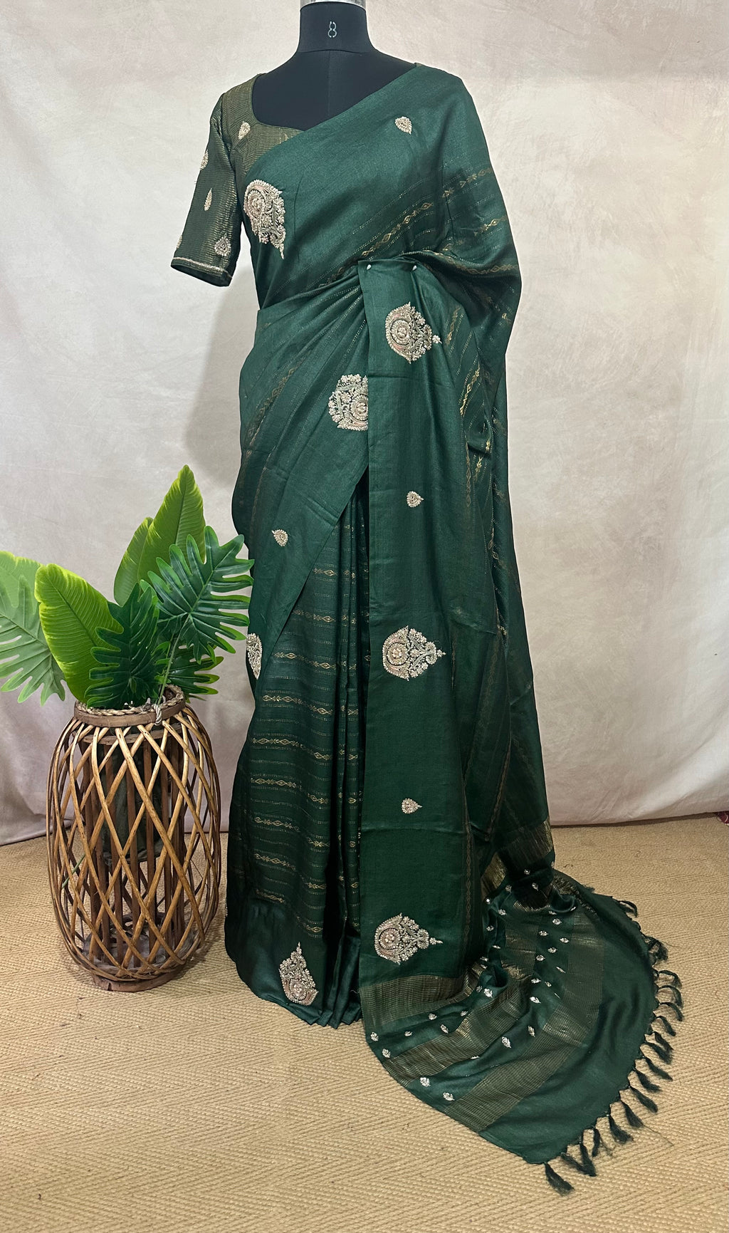 Bottle green pure tussar silk saree with hand work and stitched blouse