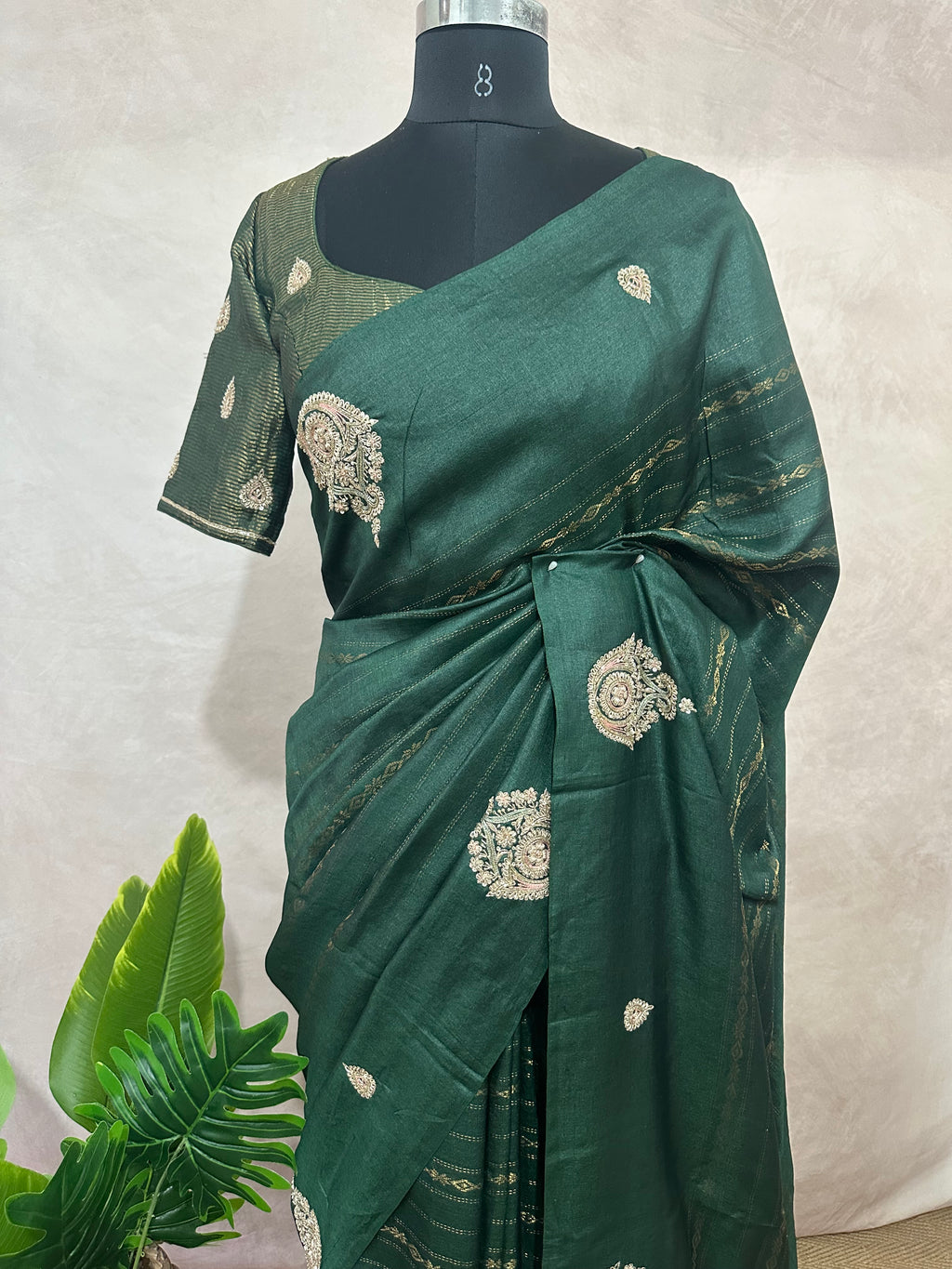 Bottle green pure tussar silk saree with hand work and stitched blouse
