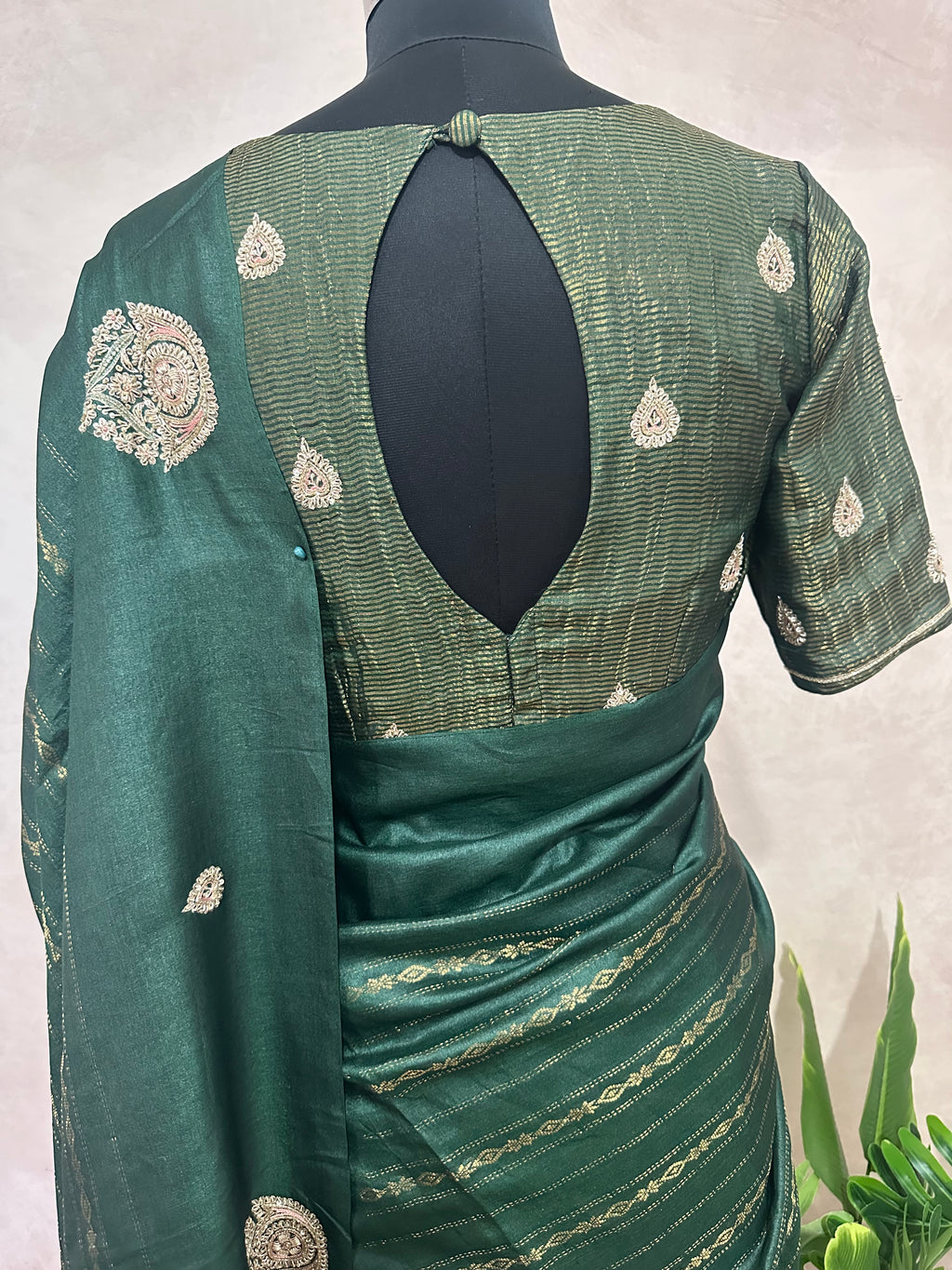 Bottle green pure tussar silk saree with hand work and stitched blouse