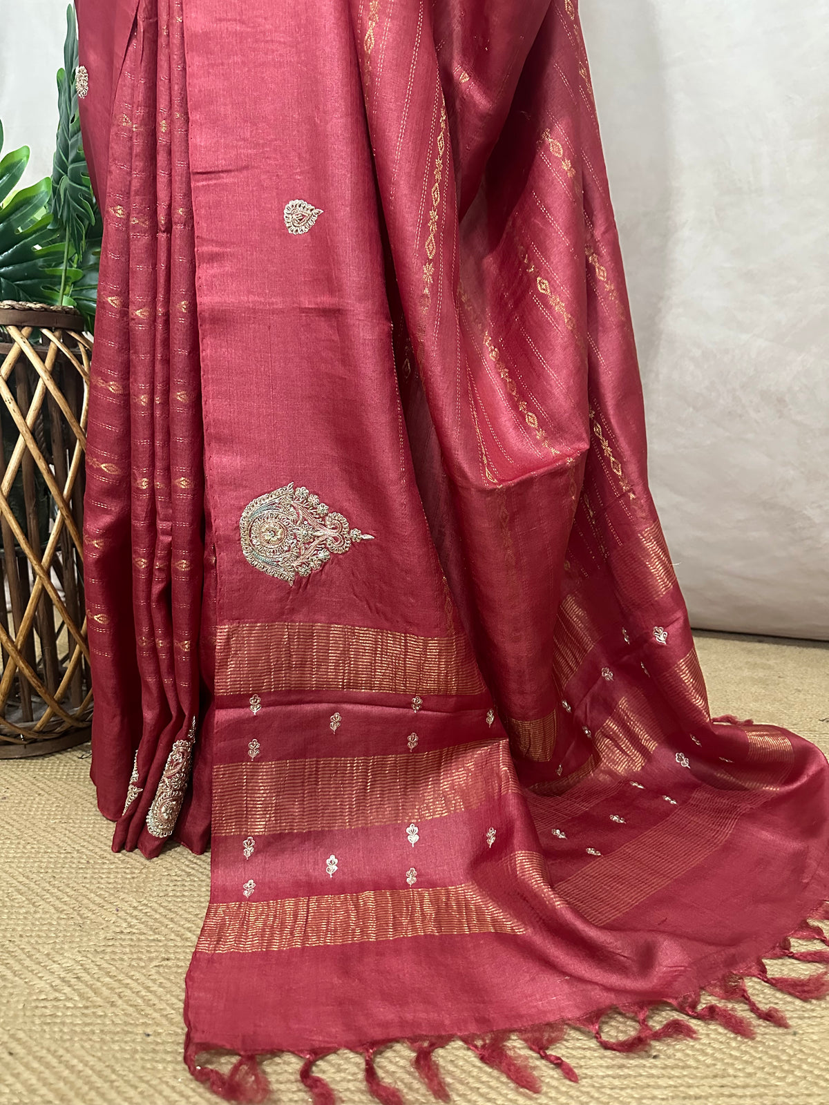 Coral color pure tussar silk saree with hand work and stitched blouse