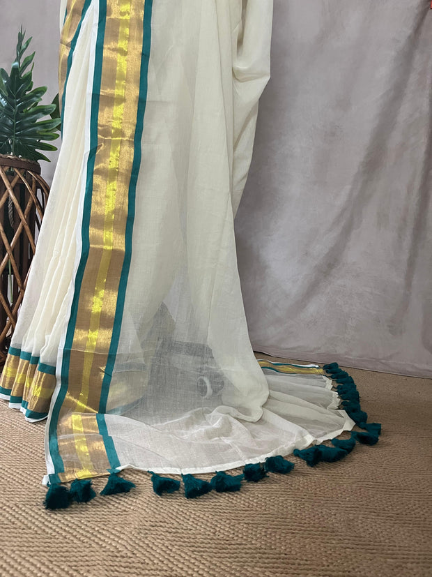 Mul cotton saree with a jade green border