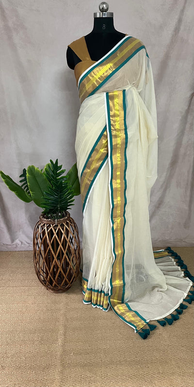 Mul cotton saree with a jade green border
