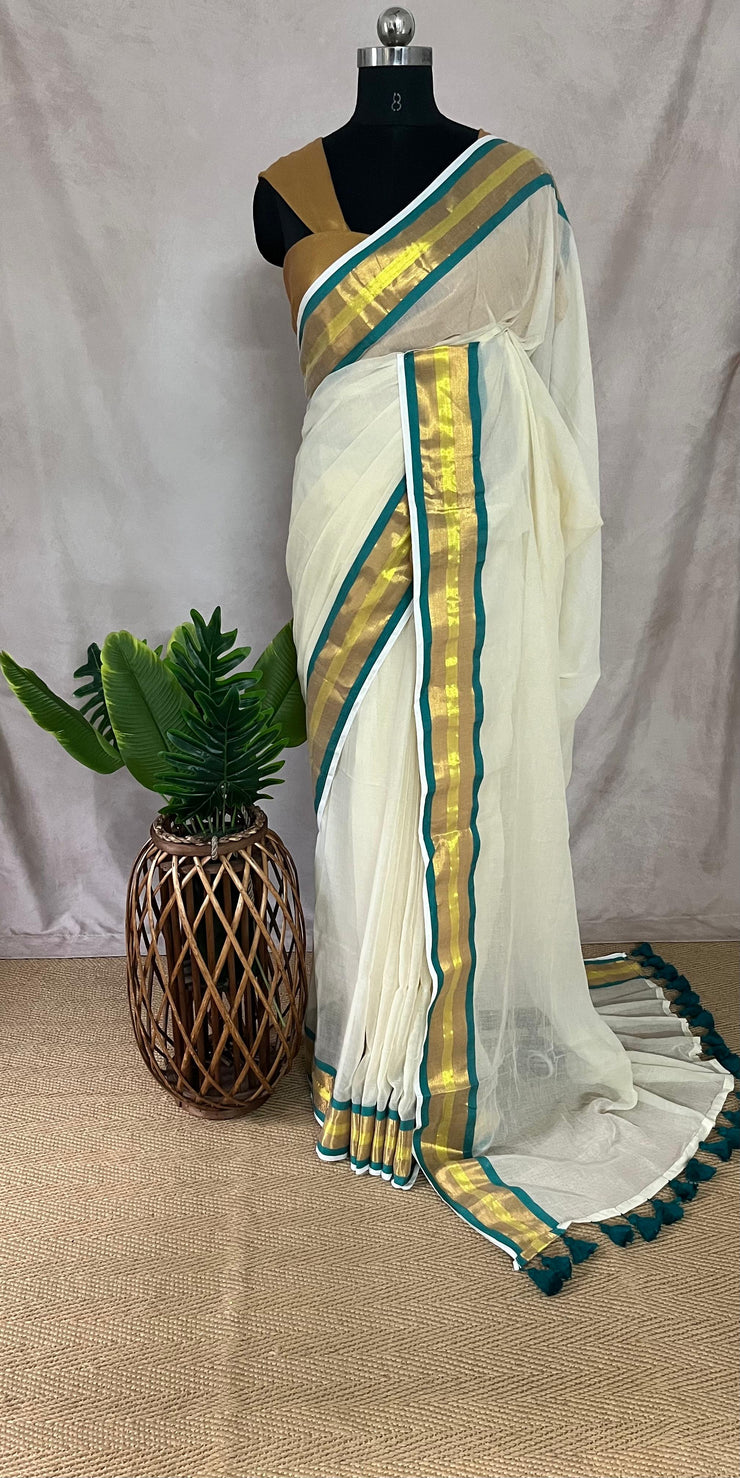 Mul cotton saree with a jade green border