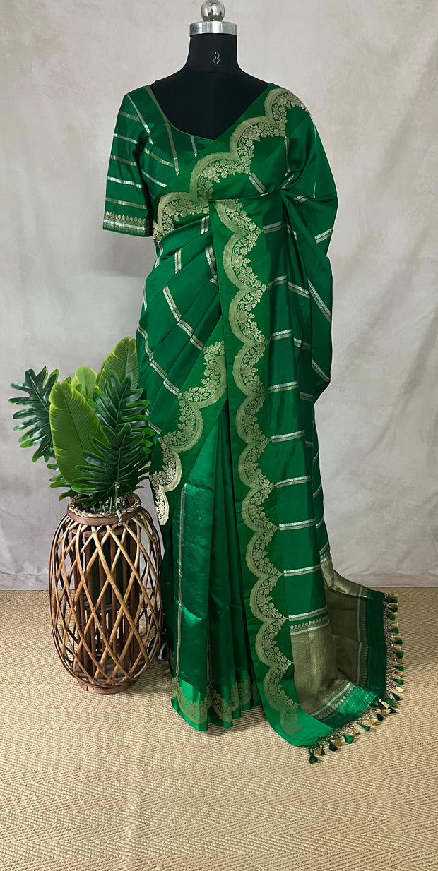 Green soft katan silk saree with silver border, with stitched blouse