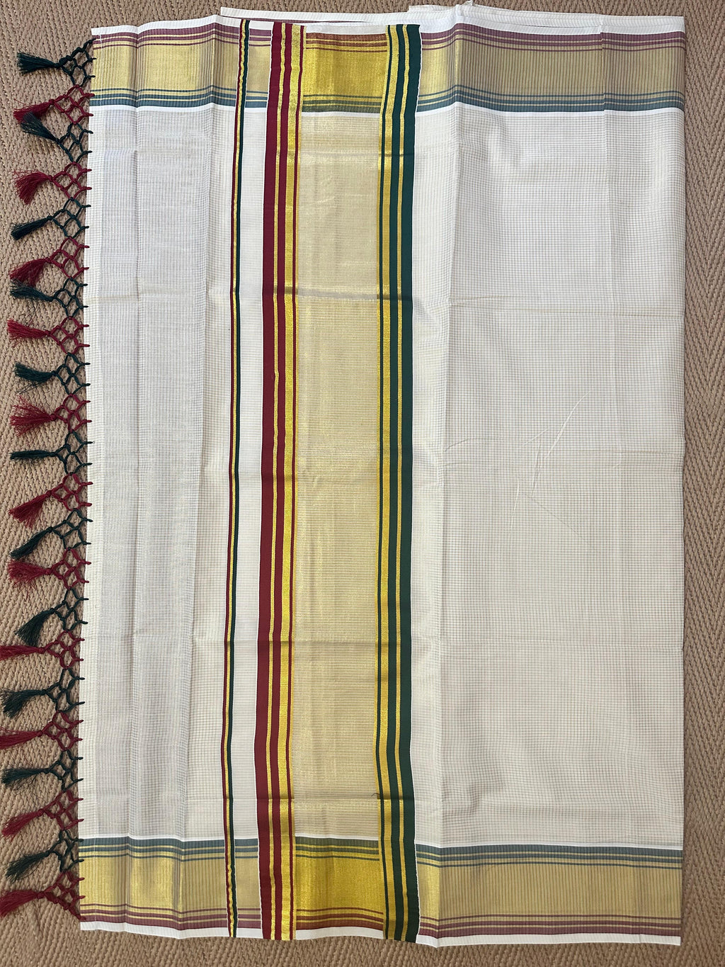 set saree with green and maroon border and gold lines