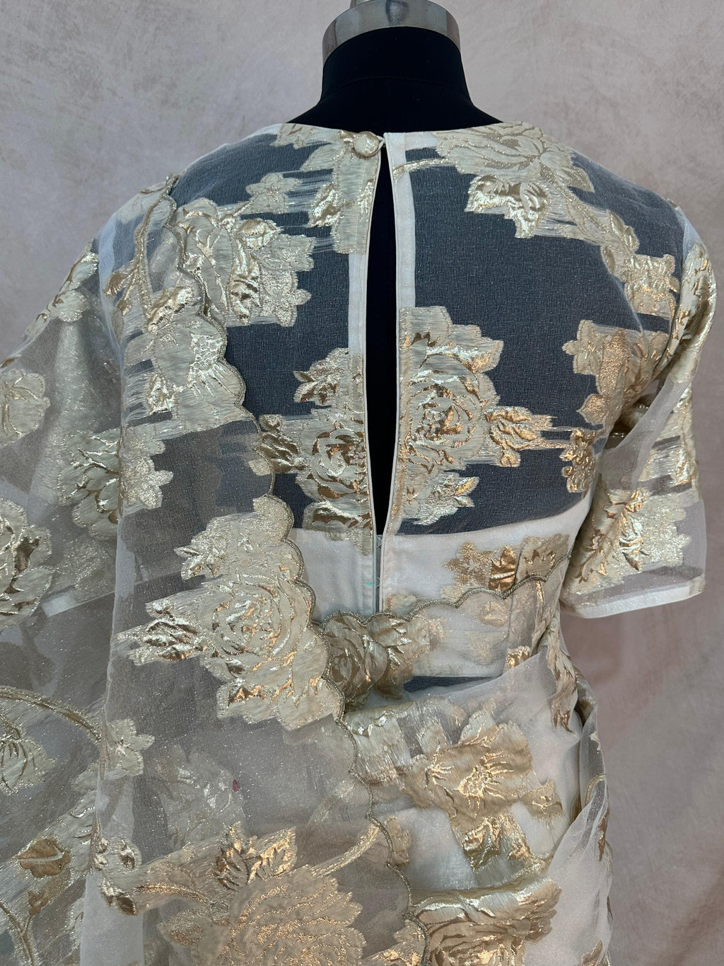 Off white turkkish organza saree with stitched blouse