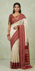 Asam silk saree with Red broder and stitched blouse