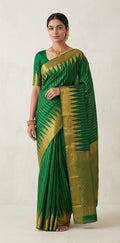 Handloom pure silk green gadwal silk saree with stitched blouse