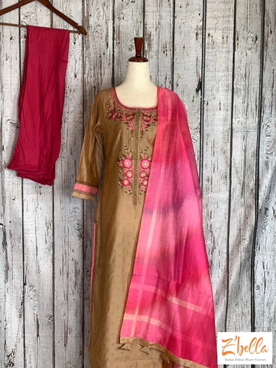 Embroidered Chikoo Color Top With Pink Bottom And Ikkat Print Dupatta Salwar Suit