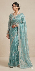 Blue tissue designer saree with stitched blouse and under skirt