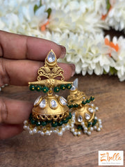 Gold Jhumka With Green Beads Earrings Tone