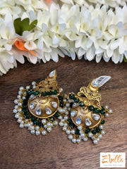 Gold Jhumka With Green Beads Earrings Tone