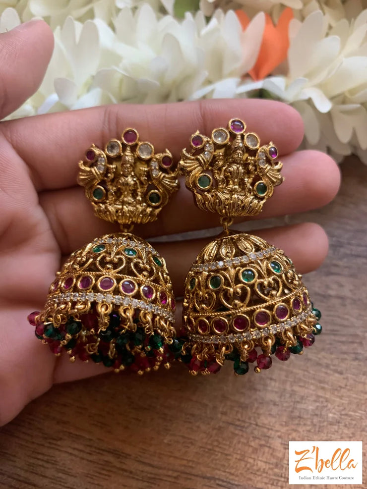 Jhumka With Red And Green Stones Earrings Gold Tone