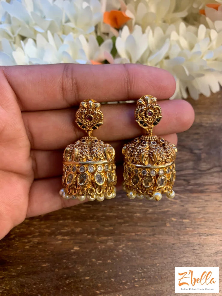 Jhumka With White Transparent Stone Earrings Gold Tone