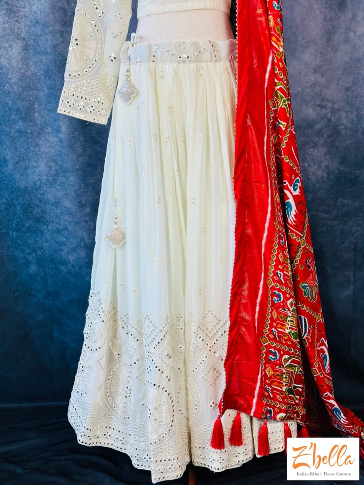 Off White Chikan And Sequins Work Skirt Long Sleeve Blouse With Red Pattola Print Dupatta Lehanga
