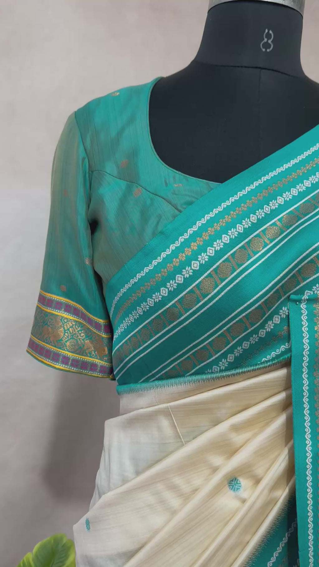 Asam silk saree with Turquoise green broder and stitched blouse