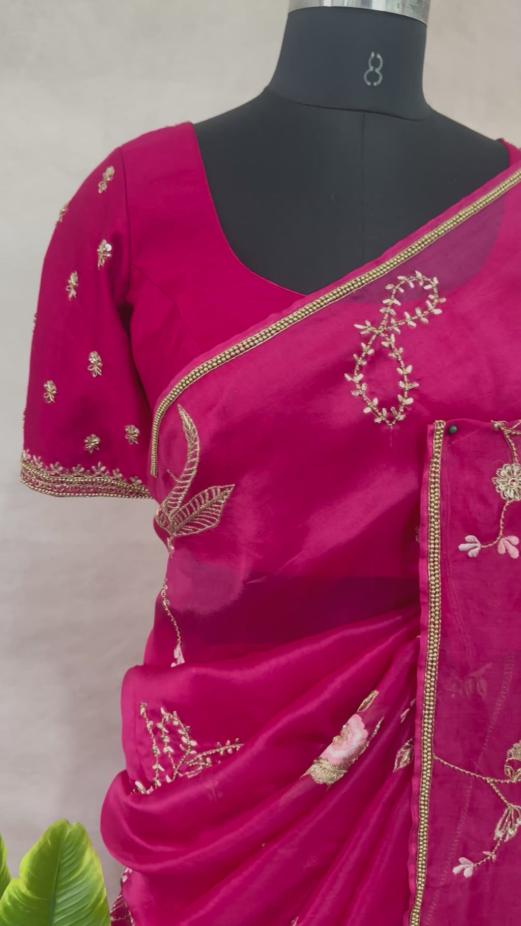 Pink organza saree with han embroidery and stitched blouse