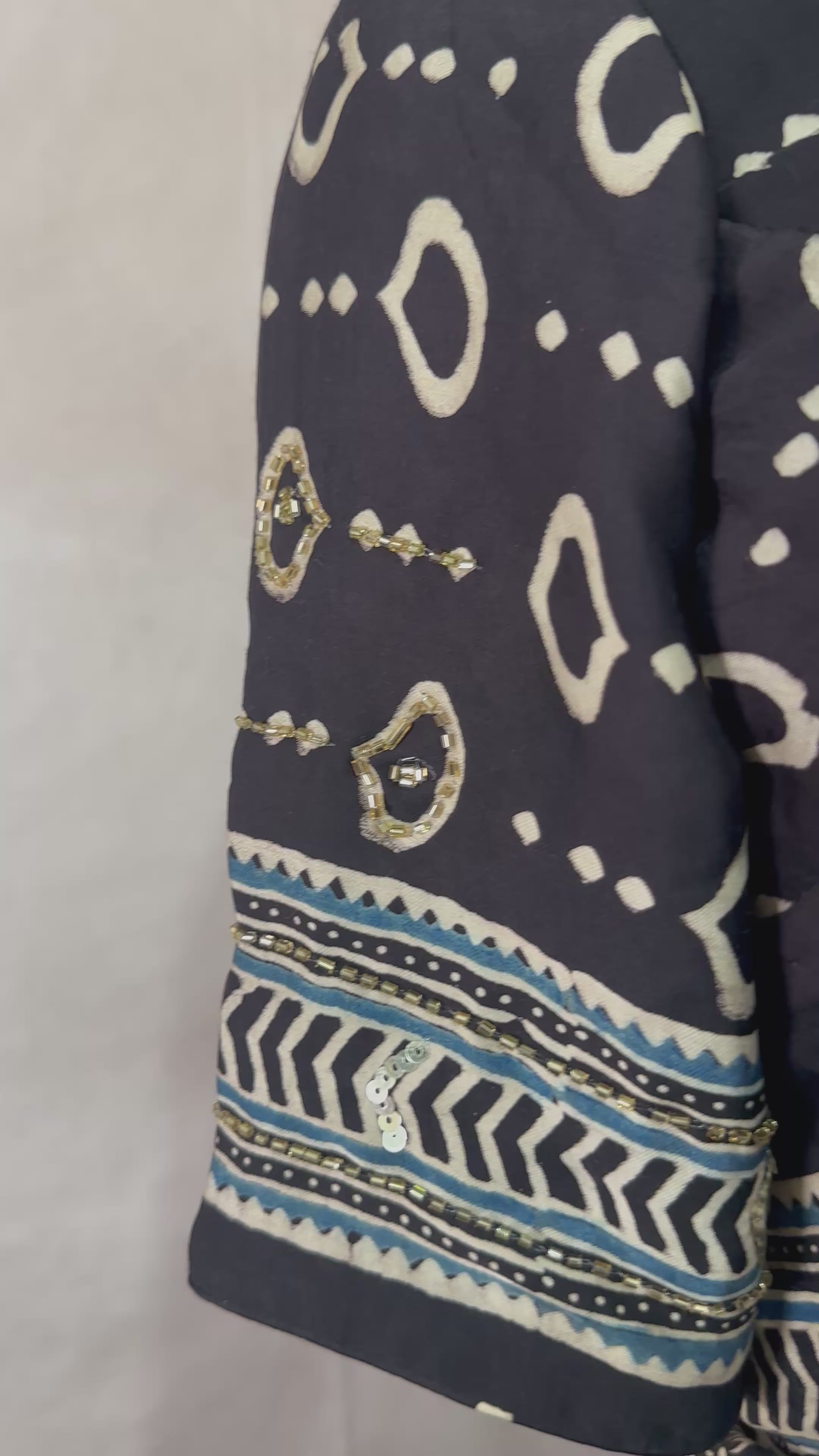 Modal silk saree with bead and mirror work , stitched blouse