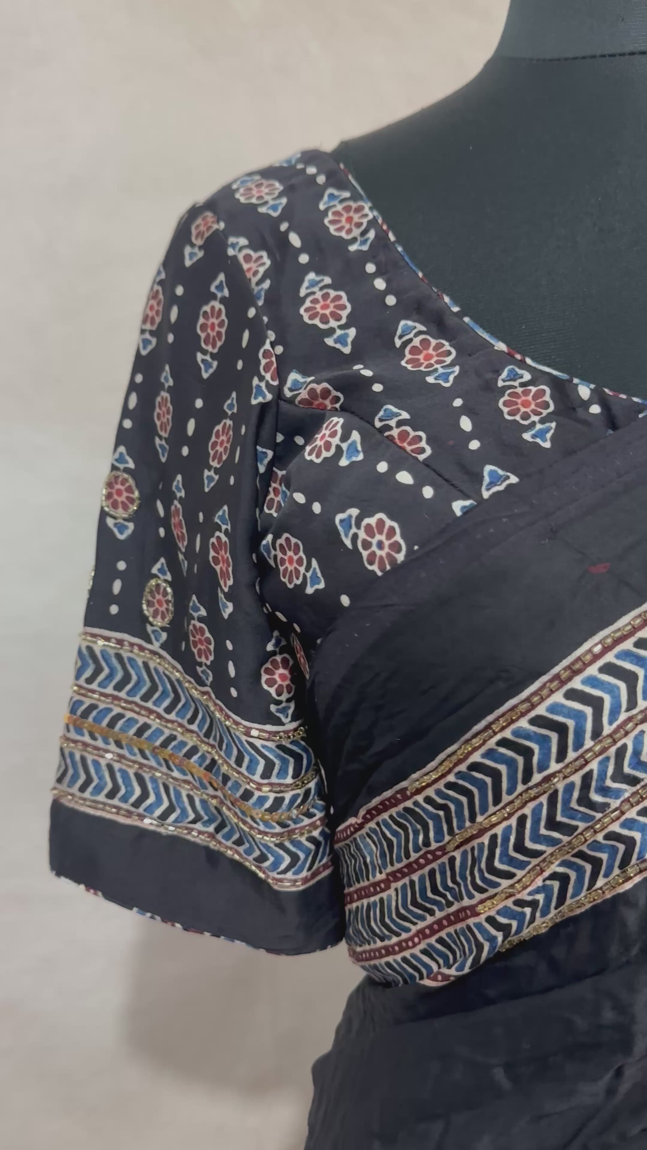 Modal silk saree with bead and mirror work , stitched blouse