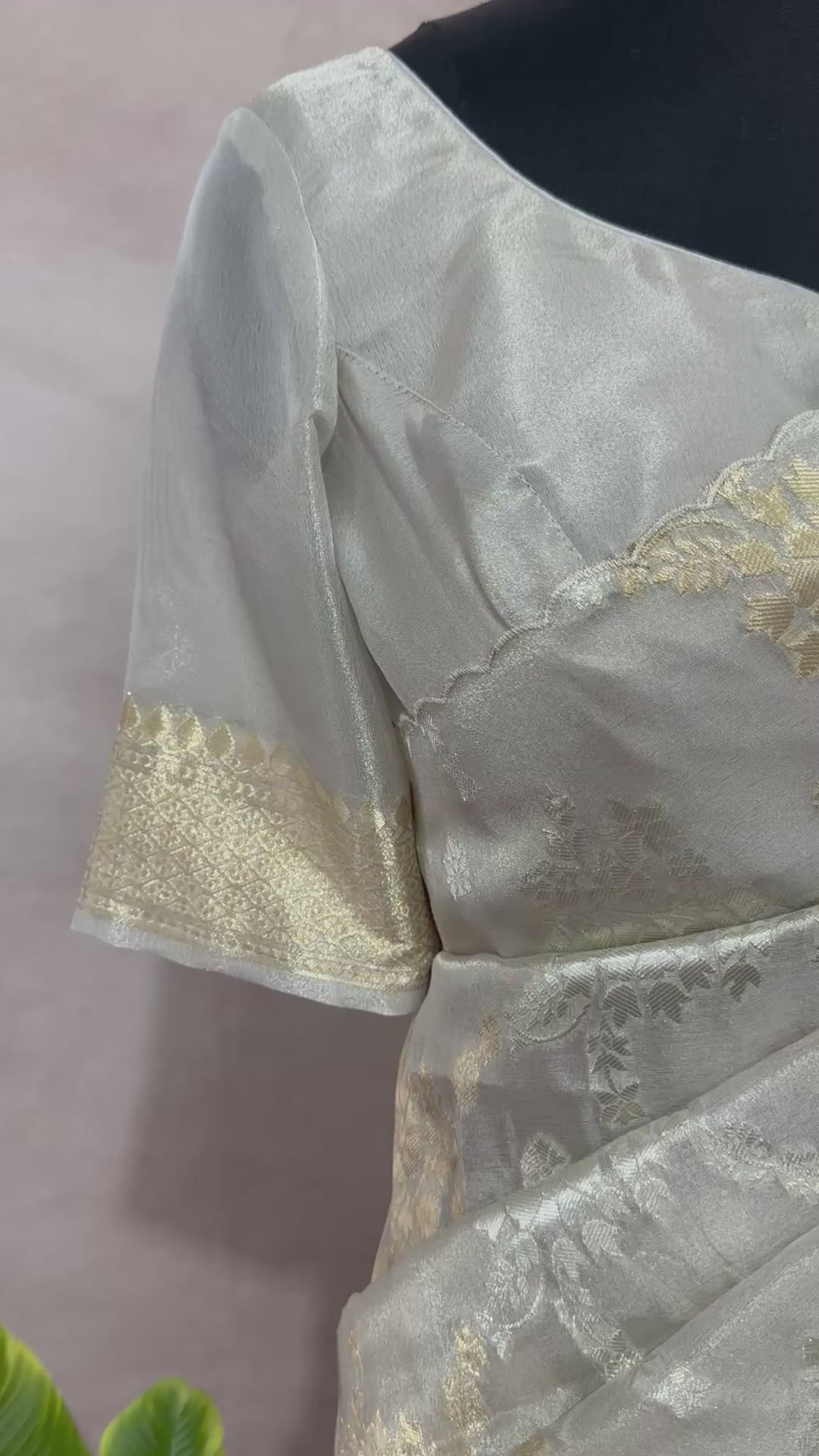 Silver tissue saree with gold floral weave, with stitched blouse