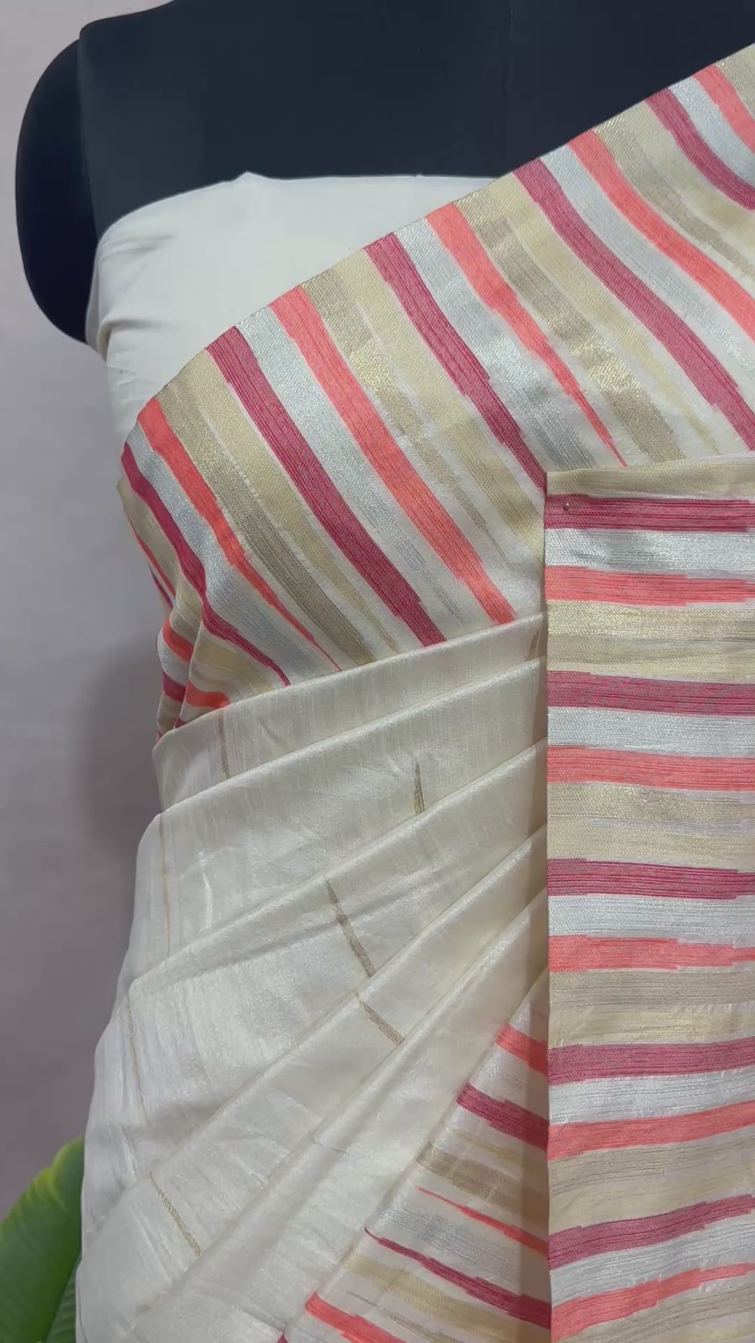 Off white Semi silk saree with peach and gold temple border
