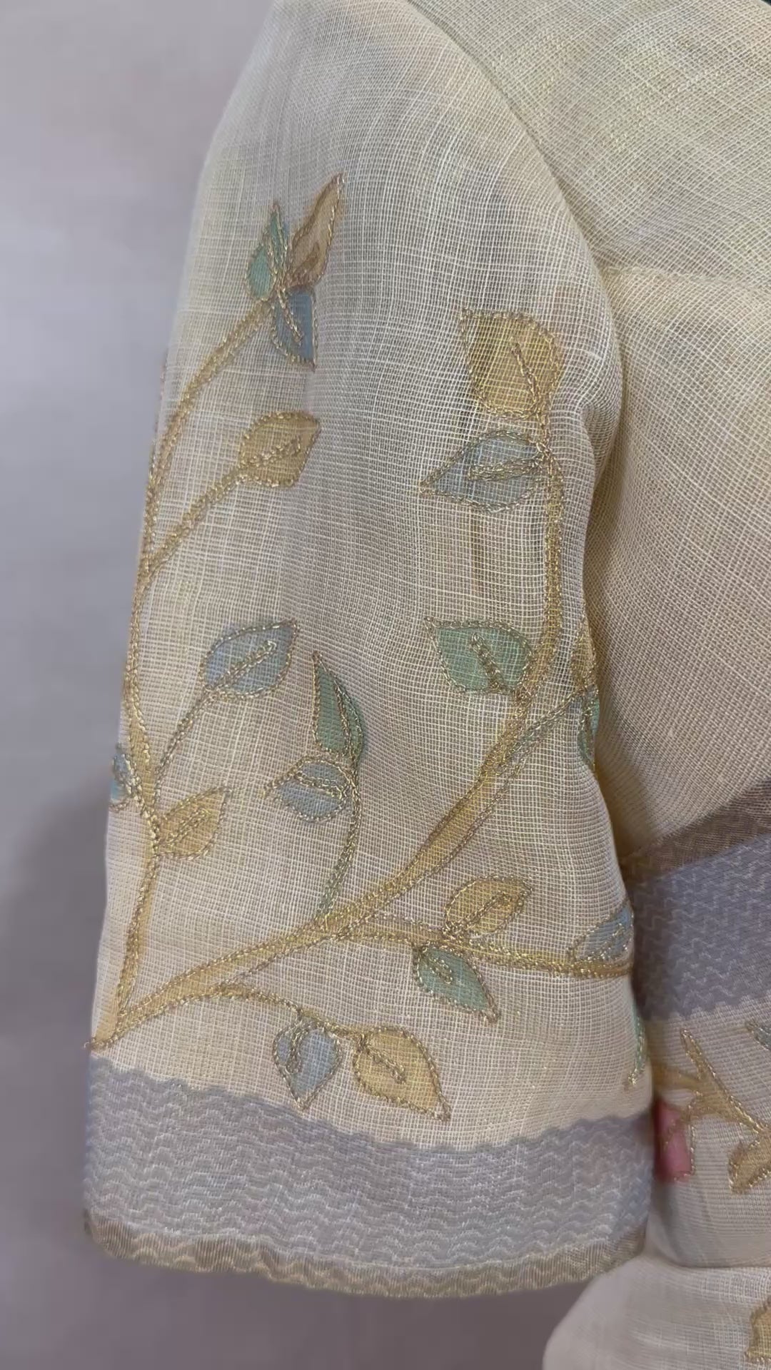 Printed Tissue linen saree with thread work, and stitched blouse