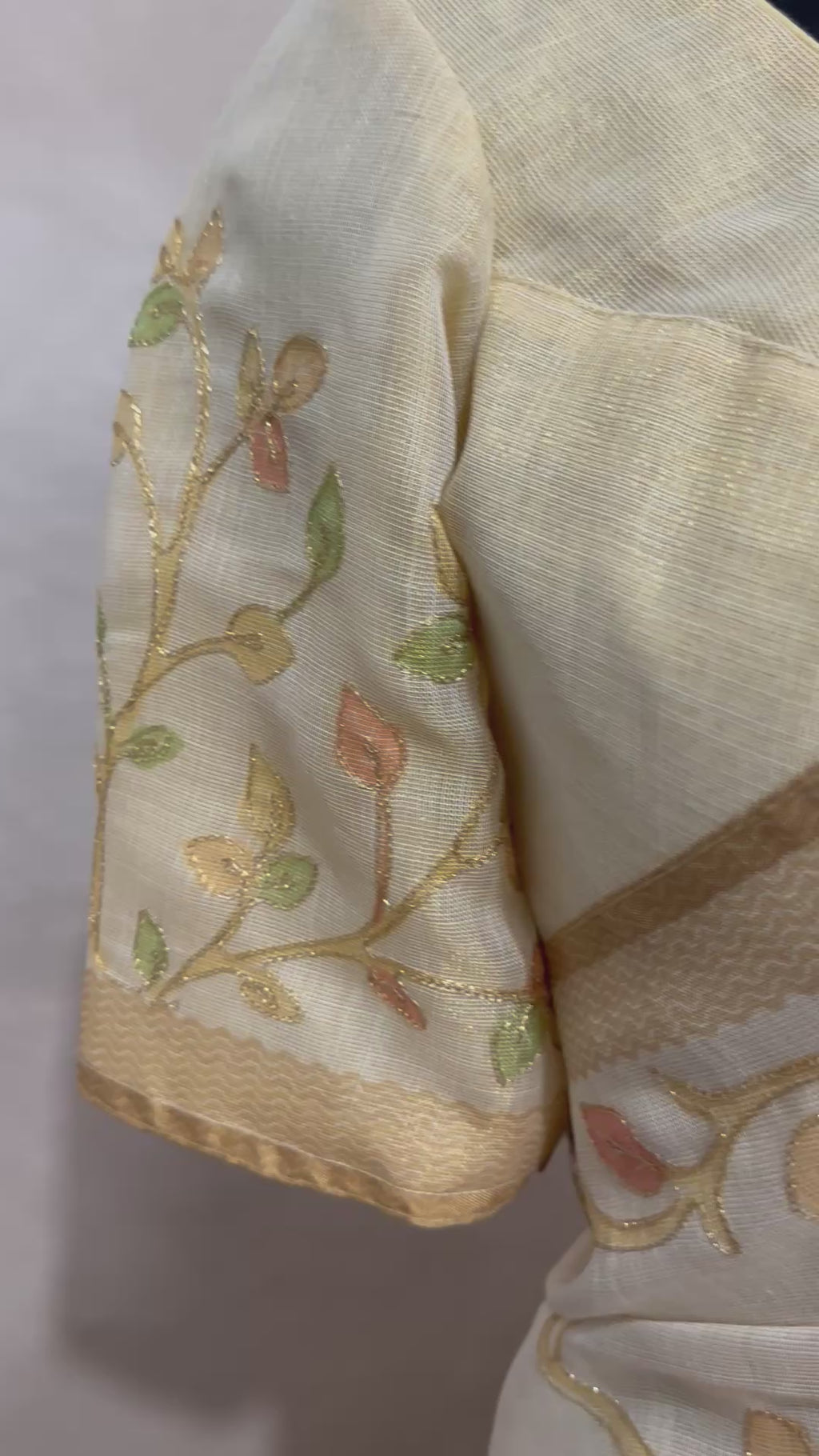 Printed Tissue linen saree with thread work, and stitched blouse