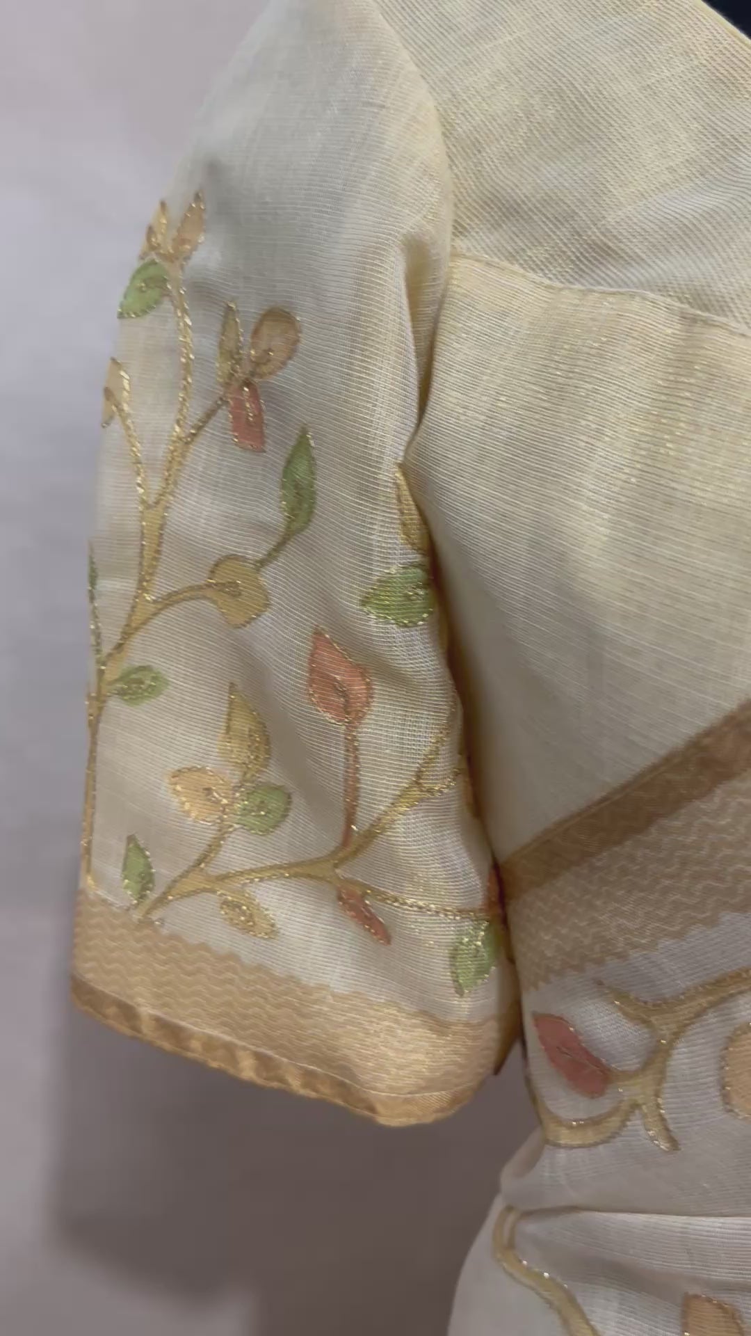 Printed Tissue linen saree with thread work, and stitched blouse