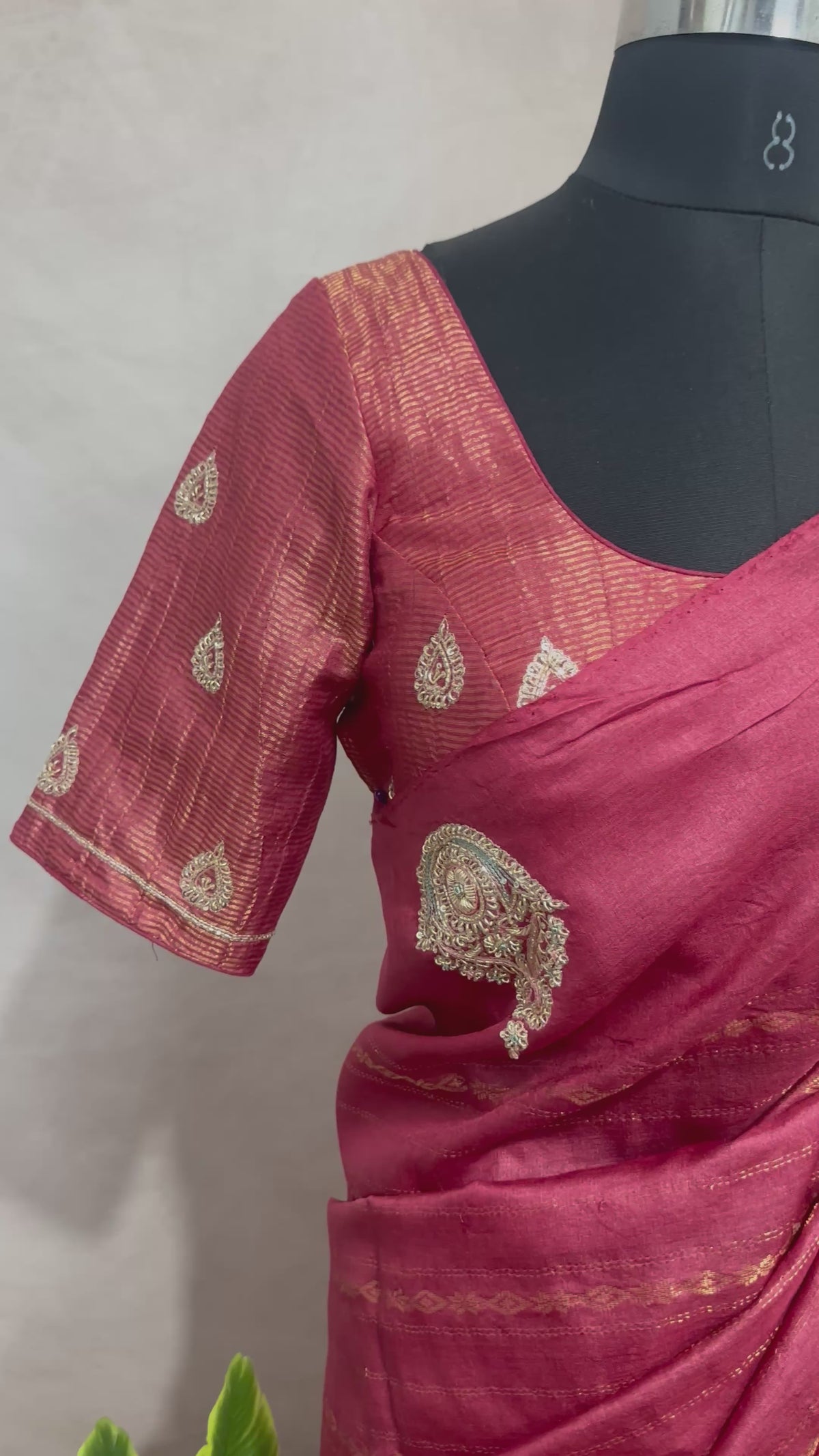 Coral color pure tussar silk saree with hand work and stitched blouse