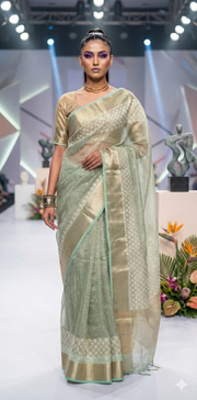 Light green Tissue Kotta silk saree with mirror and chikankari work, with stitched blouse