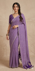 Lahariya printed tussar silk saree with handwork , stitched blouse