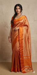 Orange stripe tissue silk saree with stitched blouse