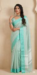 Light pista green stripe tissue silk saree with stitched blouse