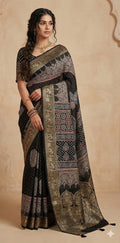 Ajrakh hand block printed premium dola silk saree with stitched blouse