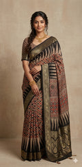Ajrakh hand block printed premium dola silk saree with stitched blouse