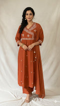 Rust orange ankhara kurti with bottom and dupatta